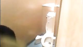 Japanese Babe in Black Dress Seduces in the Toilet Stall