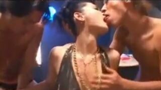 Two Dudes Kiss Hot JAV Model on Center Stage