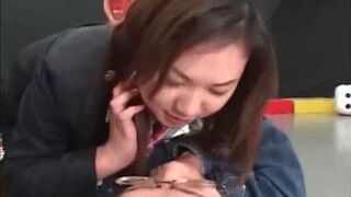 Sultry Japanese Bimbo Gives Handjob on Her Knees