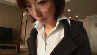 Short-Haired Japanese Office Lady with Glasses Poses Seductively Indoors