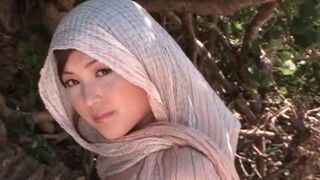 Japanese Beauty flaunts Luscious Curves in Seductive Bikini Display