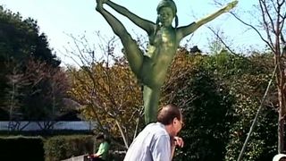 Public Statute Gets Vibrant Makeover During Steamy Outdoor Encounter