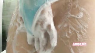 Seductive Japanese Beauty Engages in Steamy Fucking Session
