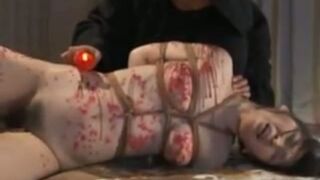 Candlelit Seduction – Asian MILF Enjoys Sensual Wax Play