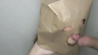 Exploring the Art of Face Fucking with a Sexy Asian Babe Using a Paper Bag