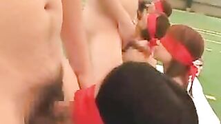 Blindfolded Japanese Porn Stars Take Turns Sucking Cock