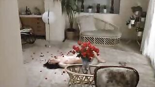 Asian Beauty Enjoys Orgasmic Bliss with a Rose
