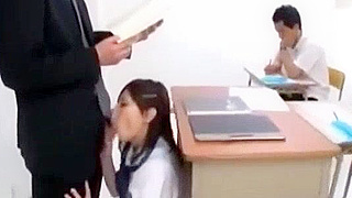 Japanese Teacher Seduces Student in JAV Classroom Scene
