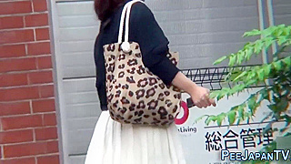 Japanese Woman Pees in Public - Weird yet Exciting Porno Clip