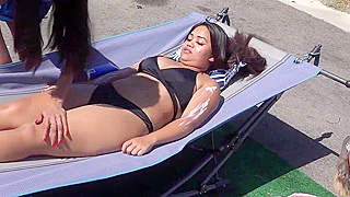 Japanese Babe Tastes Sun Tan Lotion Before Getting Rubbed Down by Strangers