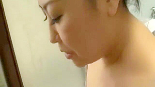 Alluring Japanese StepMom Cleans Up in a Sexy Bath Routine
