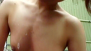 Mature Japanese Beauty Kayoko Uesugi Pleasures Her Man Outdoors in a Steamy Bath Scene