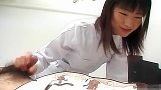 JAV Enchantress Saki Budou Delivers a Sultry Handjob to Her Lucky Patient