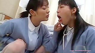 Naughty Nurses Kiss Passionately & Spit on the Hospital Floor