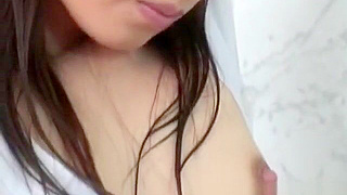 Alluring Hitomi Ikeno Seduces as a Sexy Nurse in JAV Video Part 1