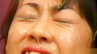 Luscious JAV Enchantress Unleashes Her Allure in Classic Bukkake Scene