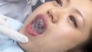 Luscious Dentist Will Make Your Mouth Water with Her Seductive Touch!