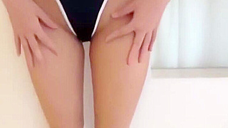 JAV Cutie Shows Off Sensual Curves in a Tight Dress