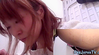 Luscious Japanese MILF Debuts in Steamy Golden Shower Scene - Must See!