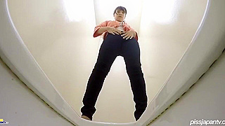 Watch Japanese MILF Enchant You with Seductive Pee Play Action!