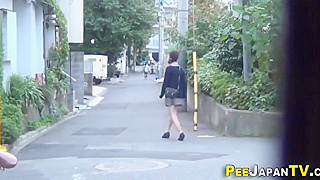 Japanese Beauty Exposes Herself in Public for Hot Urination Scene