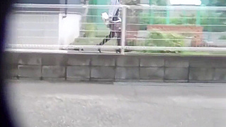 Heeled Asian Beauty Seduces with Sultry PeeStreet Action