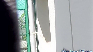 Luscious Japanese Slut Gets Drenched in Piss on the Streets