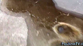 Japanese Beauty Unleashes Sweet Golden Shower on Busy City Streets!