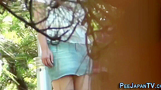 Japanese Beauty in High Heels Pees Outdoors – Ultimate Outdoor Action!