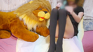 Japanese Beauty in Pantyhose Teases with Toy Lion & Massager for Hot Pleasure