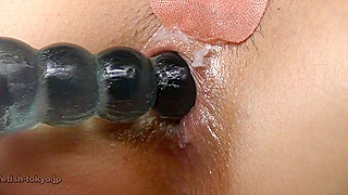 Japanese MILF Kazumi Enjoys Sultry Solo Anal Pleasure