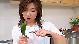 Hot Asian MILF Saku Momoa Gets Steamy with Vegetables in a Sultry Solo Scene.
