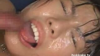 Asian Beauty Gets Covered in Jizz During Busty Bukkake Feast