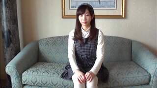 Shy looking Japanese girl gets pussy stretched and fingered